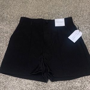 Black high rise business shorts